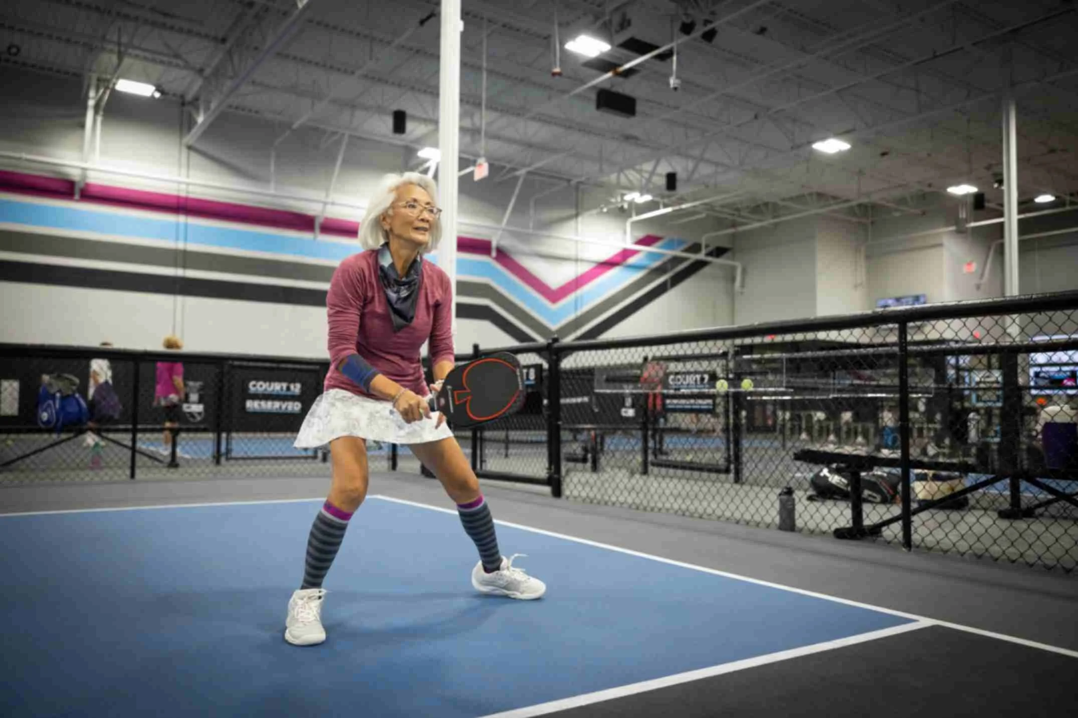 Woman gets ready for the serve
